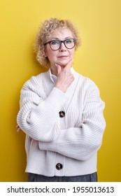 Senior Beautiful Grey-haired Woman Having Serious Face Thinking About Question, Very Confused Idea