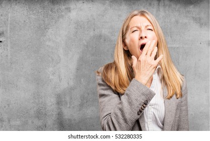 Senior Beautiful Woman Yawning