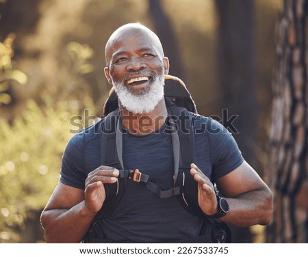 Senior black man hiking in nature for outdoor discovery, fitness walking and forest travel journey. Happy hiker person trekking in woods for retirement health, cardio wellness and camper holiday