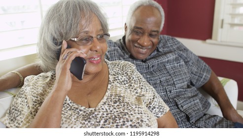 Senior black woman talking on the phone 