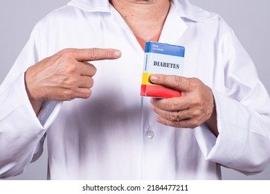 Senior Brazilian Doctor In White Coat, No Face, Holding Medicine Box