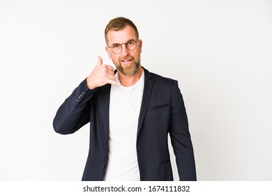 Senior business man isolated on white background showing a mobile phone call gesture with fingers. - Powered by Shutterstock