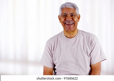 Senior Business Man Working In His Office