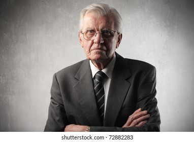 Senior businessman with angry expression