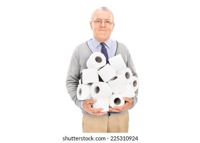 Senior Carrying A Pile Of Toilet Paper Isolated On White Background