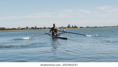 Senior caucasian man rowing boat on a river. sport retirement leisure hobbies rowing healthy outdoor lifestyle. - Powered by Shutterstock