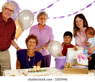 A senior celebrating her 80th birthday with family and friends. - Powered by Shutterstock