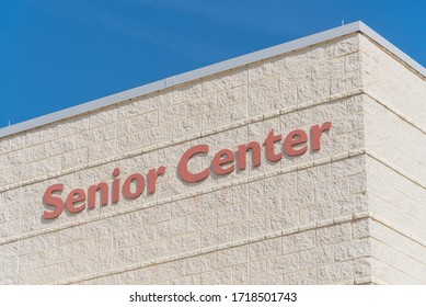 Senior Center Text Close Up On Facade Exterior Building In Texas, America Under Sunny Blue Sky.