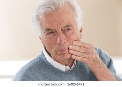 Senior With Cheek Soreness Or Tooth Pain