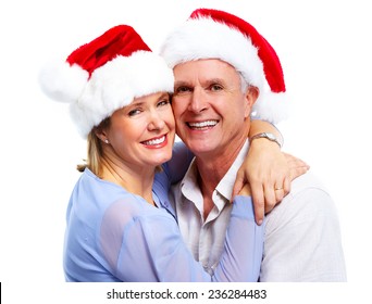 Senior Christmas santa couple isolated over white background - Powered by Shutterstock