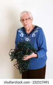 Senior Confused With Tangled Christmas Lights