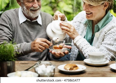 Senior Couple Afternoon Tean Drinking Relax Concept - Powered by Shutterstock