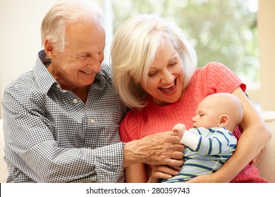Senior couple with baby grandson