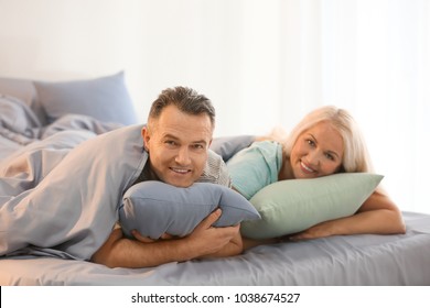 Senior Couple In Bed Together