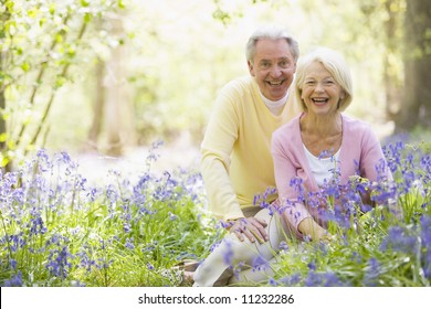 Senior couple in bluebell woods - Powered by Shutterstock