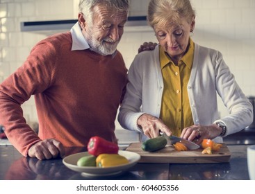 Senior Couple Cooking Food Kitchen