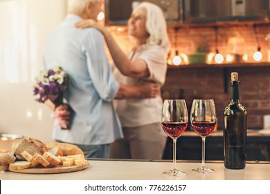 Senior Couple Cooking Together At Home Love