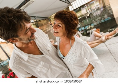 Senior Couple Dancing On A Party Outside 