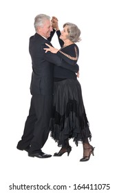 Senior Couple Dancing On White Background