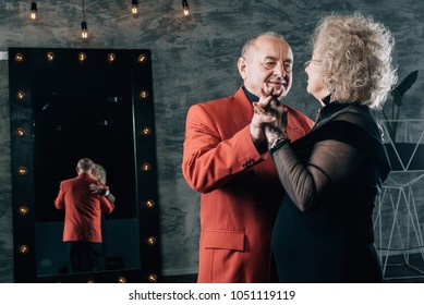 Senior Couple Dancing At Restaurant.portrait Of Senior Couple.Portrait Of Happy Senior Man And Woman Together.Senior Couple Getting Married.happy Old Age