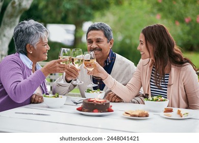 Senior, couple and daughter, outdoor and wine for celebration of anniversary of parents with food. Summer, relax and healthy diet, cake and lunch for brunch in backyard or garden, woman and family - Powered by Shutterstock