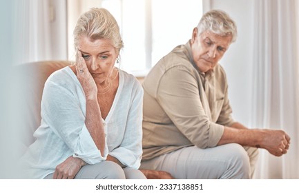 Senior couple, divorce and headache in fight, conflict or argument on the living room sofa at home. Elderly man and frustrated woman in depression, cheating affair or toxic relationship in the house - Powered by Shutterstock