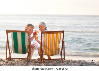 Senior couple drinking a cocktail - Powered by Shutterstock