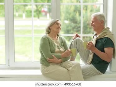 Senior Couple Drinking Tea At Home 