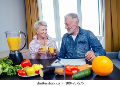 Senior couple drinking vegan smoothie with organic fruits and vegatables from eco glasses and reusable tubes - Powered by Shutterstock