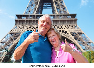 Senior Couple With Eiffel Tower In Paris