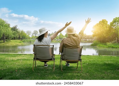 Senior Couple Embracing Serenity by the Lake at Sunset - Powered by Shutterstock