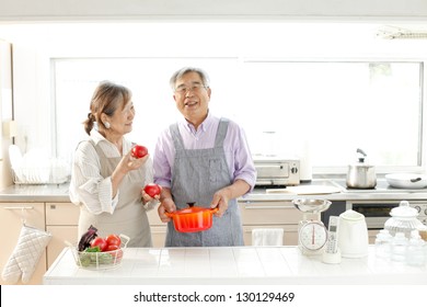 Senior Couple Enjoy Cooking