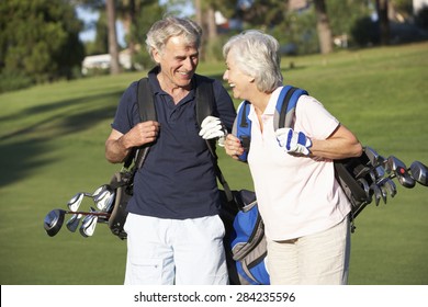 Senior Couple Enjoying Game Of Golf - Powered by Shutterstock