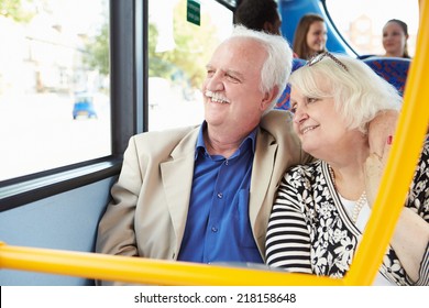 Senior Couple Enjoying Journey On Bus - Powered by Shutterstock