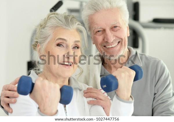 Senior Couple Exercising Gym Stock Photo 1027447756 Shutterstock