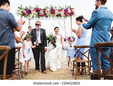 Senior Couple Getting Married At The Beach