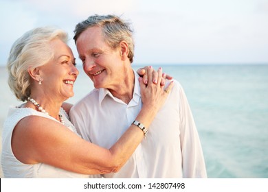 Senior Couple Getting Married In Beach Ceremony - Powered by Shutterstock