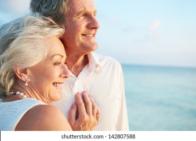 Senior Couple Getting Married In Beach Ceremony - Powered by Shutterstock