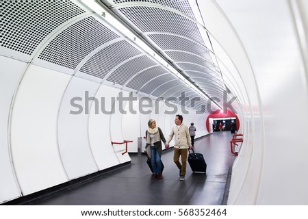 Similar – Man in tunnel (2) Movement