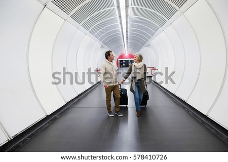 Similar – Man in tunnel (2) Movement