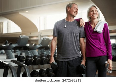 Senior couple, happy and break at gym, bottle and dumbbell for training, memory and exercise for health. Man, woman and smile together for support, workout and motivation with water at wellness club - Powered by Shutterstock