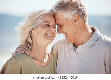 Senior couple, happy and outdoor at the beach with love, freedom and care on vacation. Face of a man and woman on retirement holiday, adventure and romantic trip in nature to relax and travel - Powered by Shutterstock