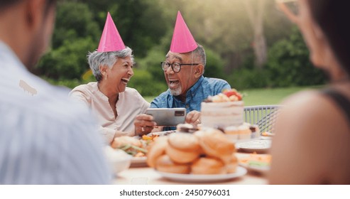 Senior, couple and happy with video call at birthday party for celebration, laughing and memories in garden. Elderly, man and woman with smartphone for photography, gathering and event in backyard - Powered by Shutterstock