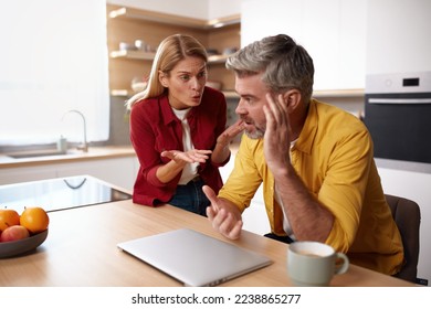 Senior Couple Having Argument. Angry Wife Shouting At Husband Of Problem. Frustrated Husband And Annoyed Wife Quarrelling About Bad Marriage Relationships