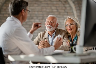 Senior couple having consultations about their supplement pills with a doctor.  - Shutterstock ID 1548876200