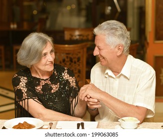 Senior Couple Having A Dinner At Restaurant
