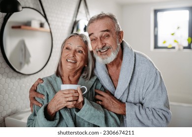 Senior couple having morning routine in their bathroom. - Powered by Shutterstock