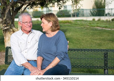 Senior Couple Having A Serious Discussion Outside