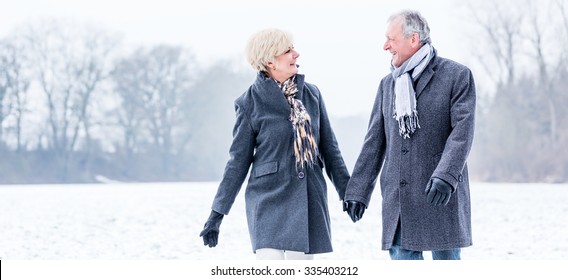 Senior Couple Having Walk In Winter