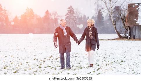 Senior Couple Having Walk In Winter